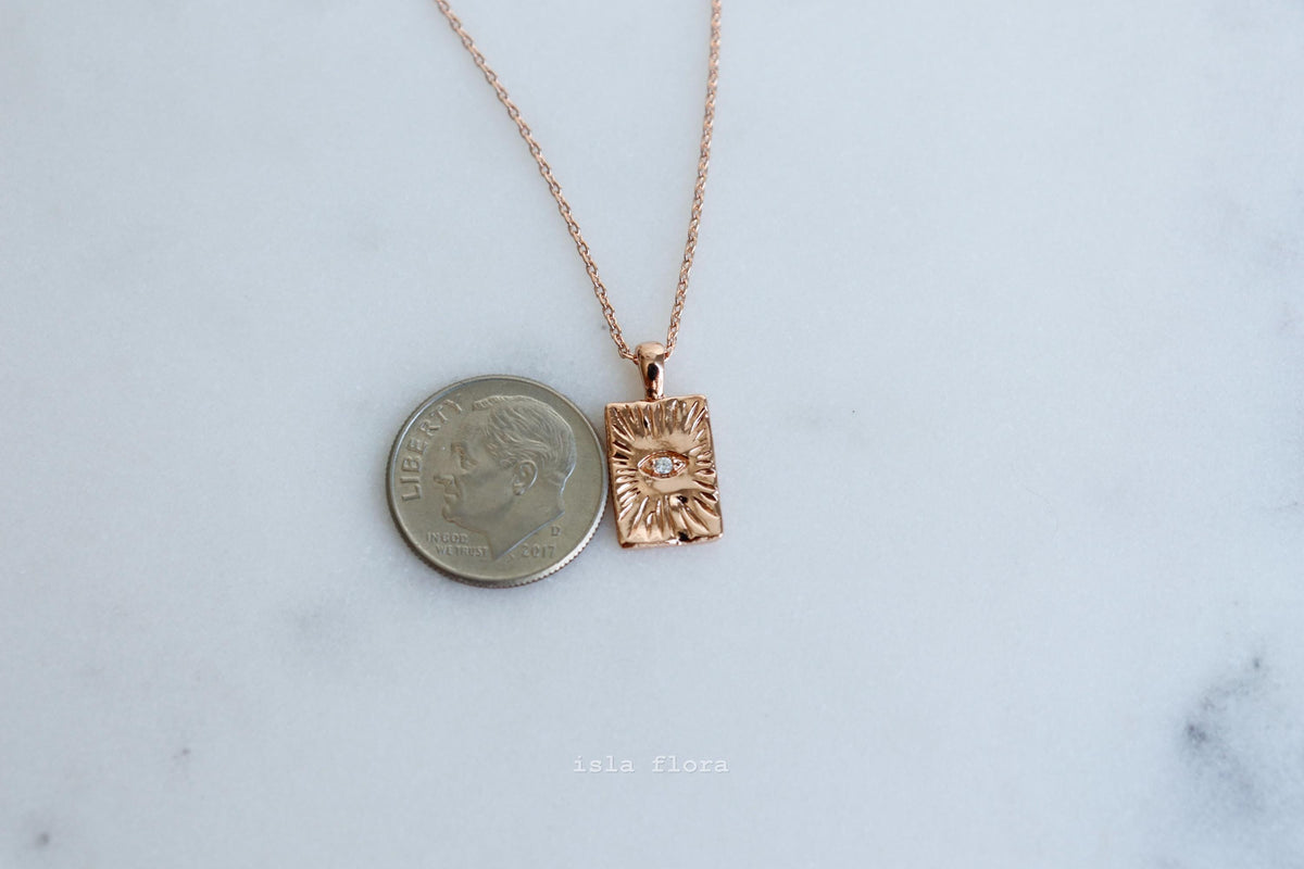 Isla Flora Protective Eye in Textured Tag Necklace