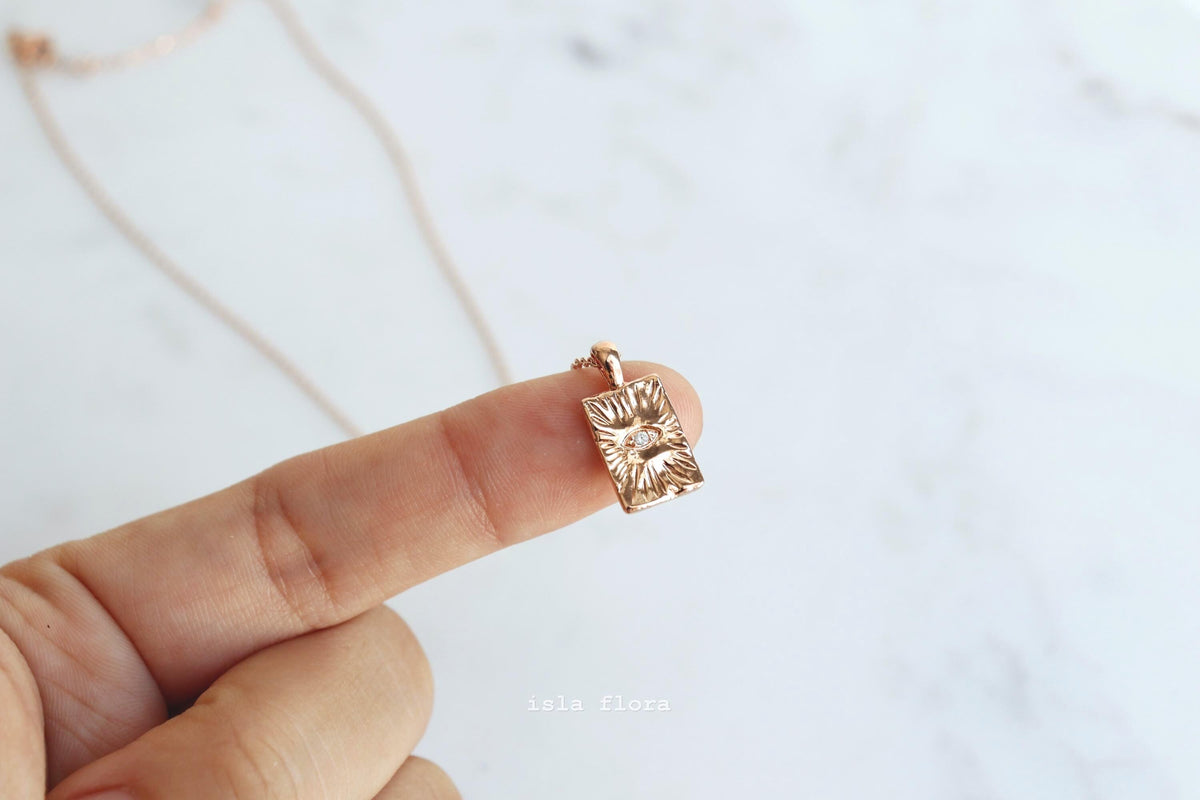 evil eye necklace in rosegold