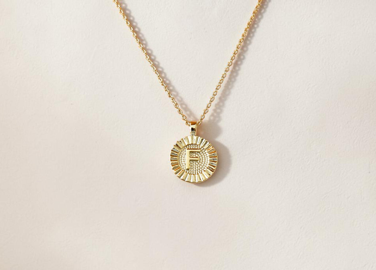f fluted medal necklace
